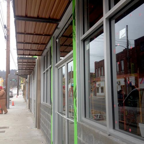 Commercial space with store front & awnings instal