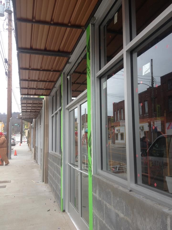 Commercial space with store front & awnings instal