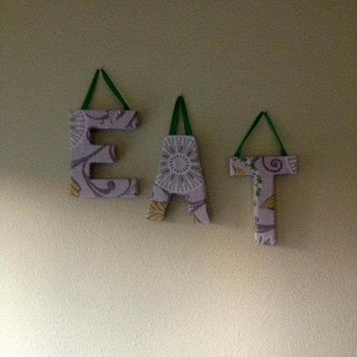 Fabric covered block letter decor.