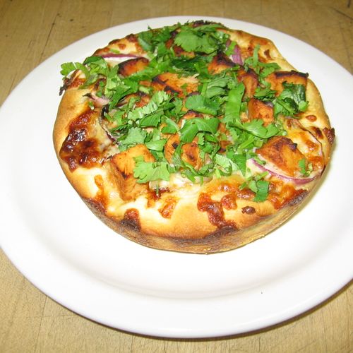 The Untouchables pizza: Red onions, cilantro, smok