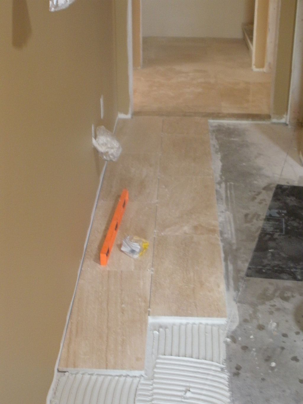 12x24 travertine  , layed on a brick joint pattern