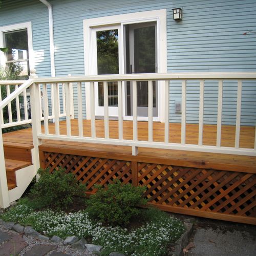 Small deck with railing.