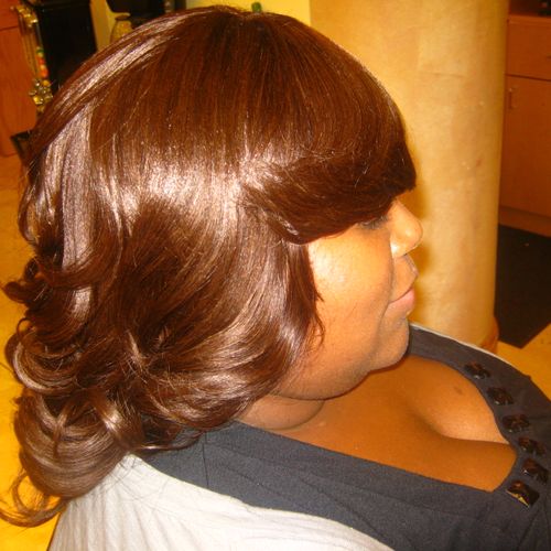 A side profile of a full sew in weave.