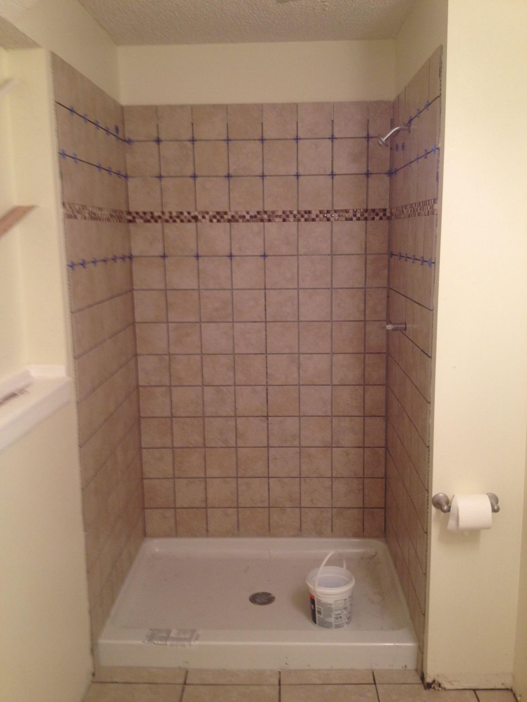 Removed shower insert and replaced with tile