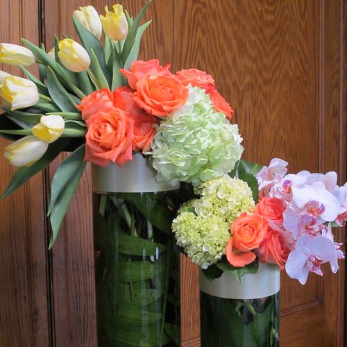 Trio arrangement of hydrangea, roses, tulips and o