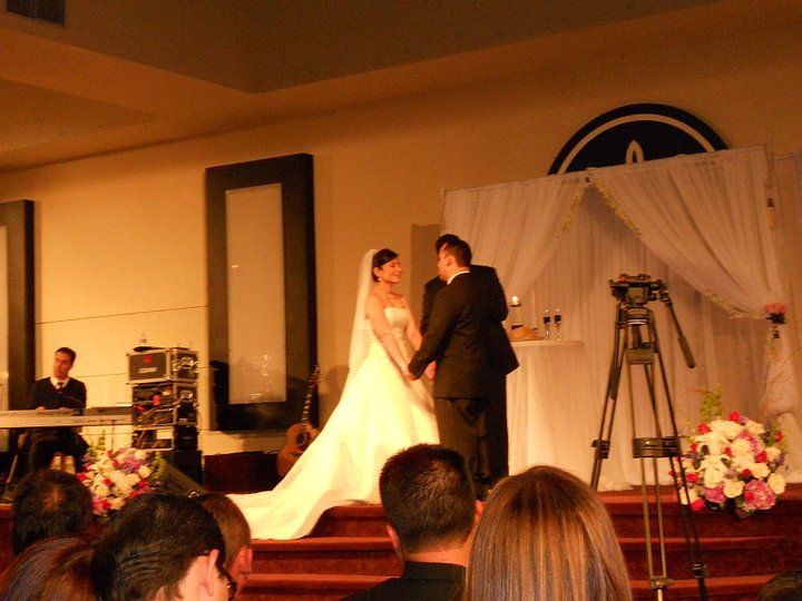 An indoor wedding performed for a lovely couple.