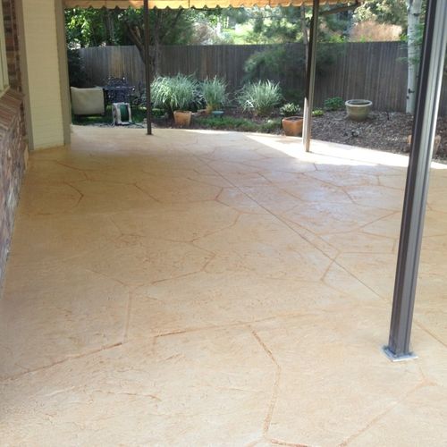 Custom concrete patio with flagstone stamp install