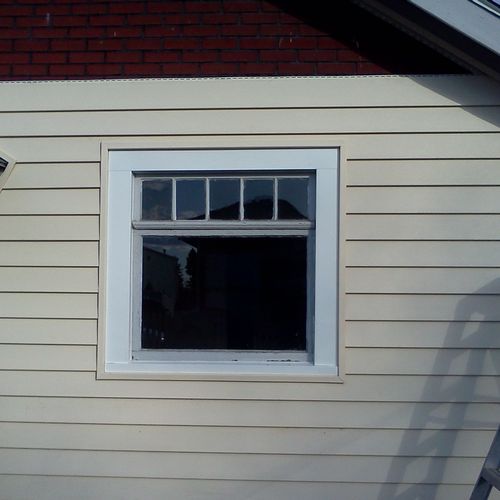 New vinyl siding and wrap window wood frame with m