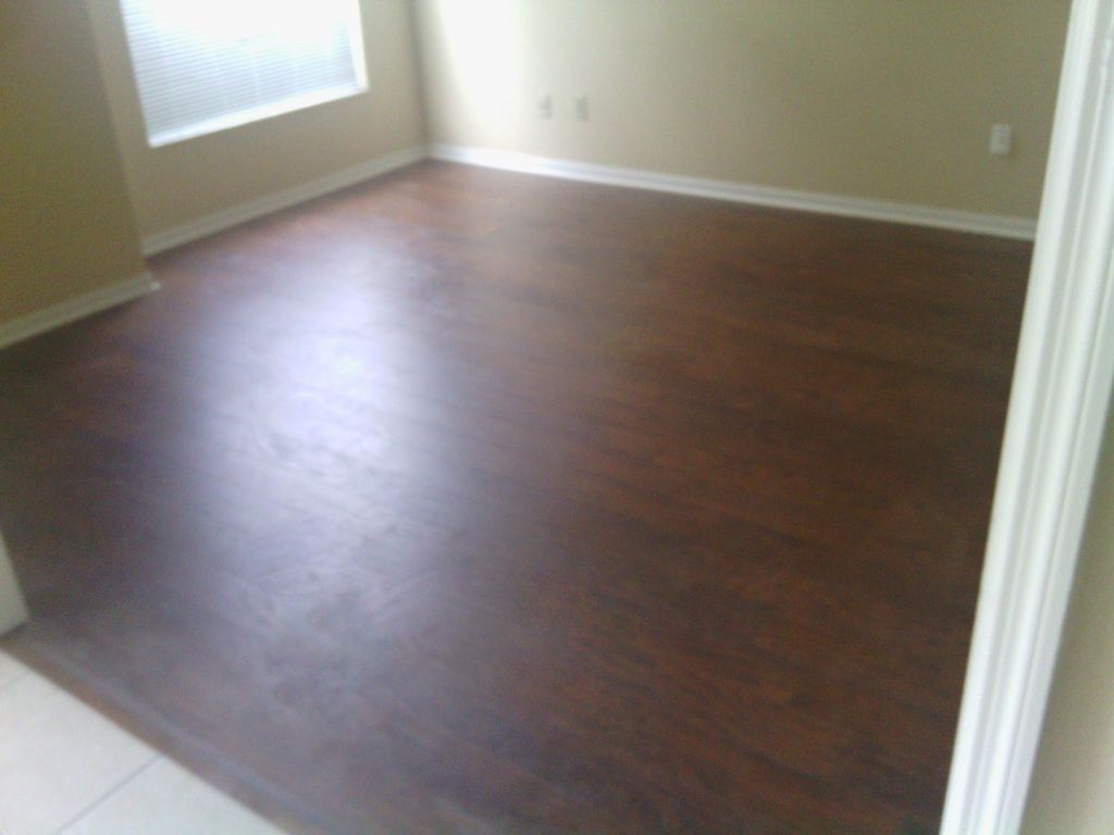 put new laminate flooring in four rooms of home