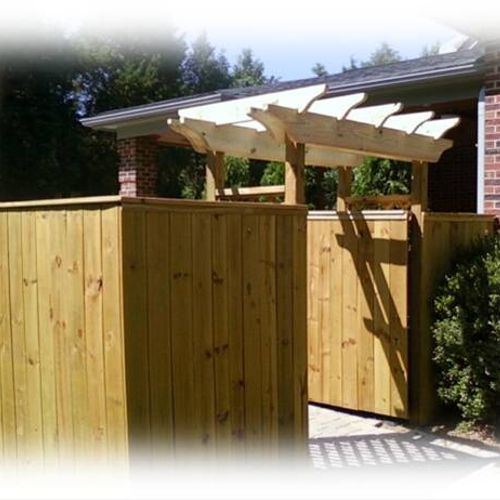 Custom privacy fence with arbor.