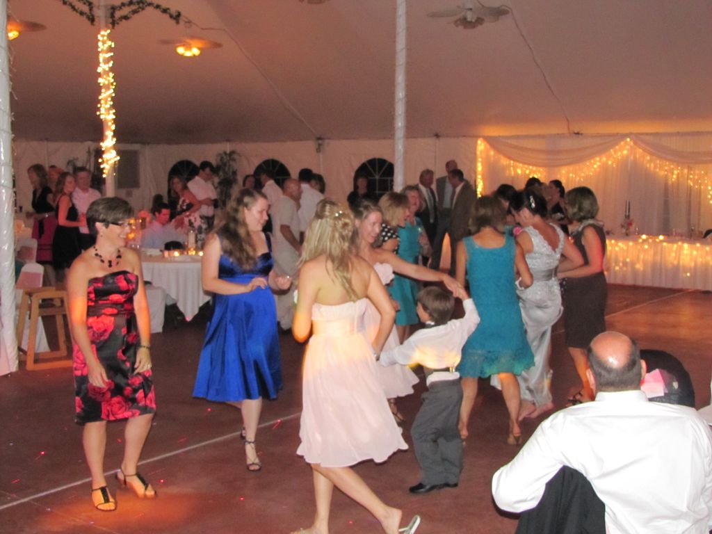 Some guests enjoying the music at a reception in S