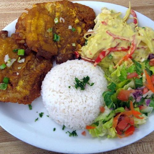 Colombian style catfish with patacones, rice and s