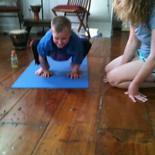 Mom spots her son in crow pose
