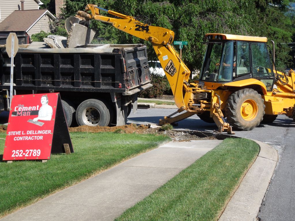 Removing and replacing concrete sidewalk