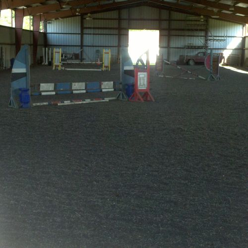 Lighted Indoor Arena With Tons of Jumps