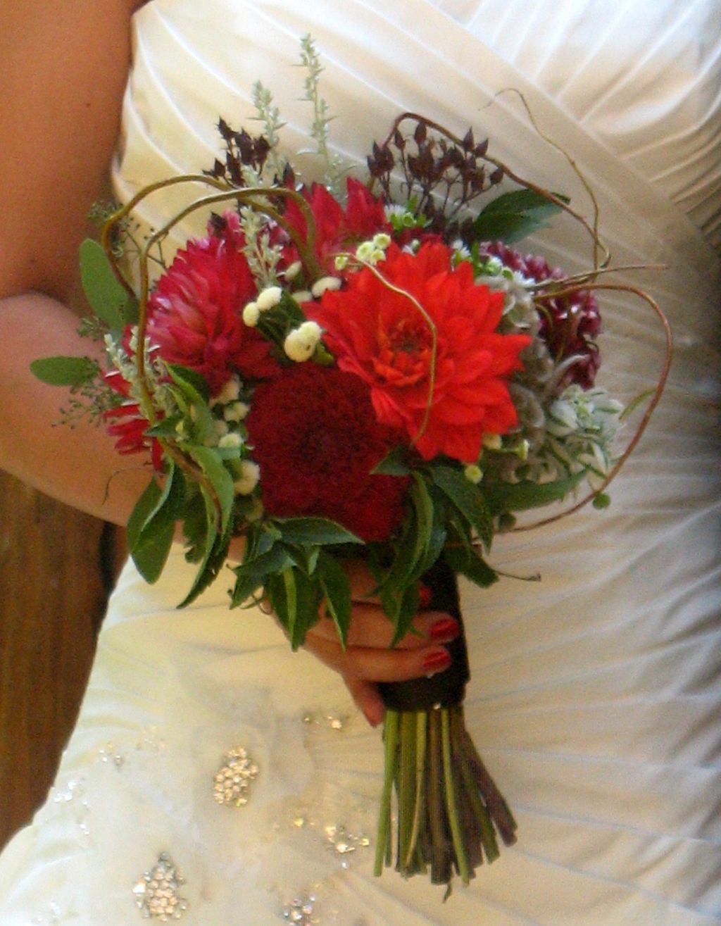 Bridal bouquet featuring mixed dahlias and a varie