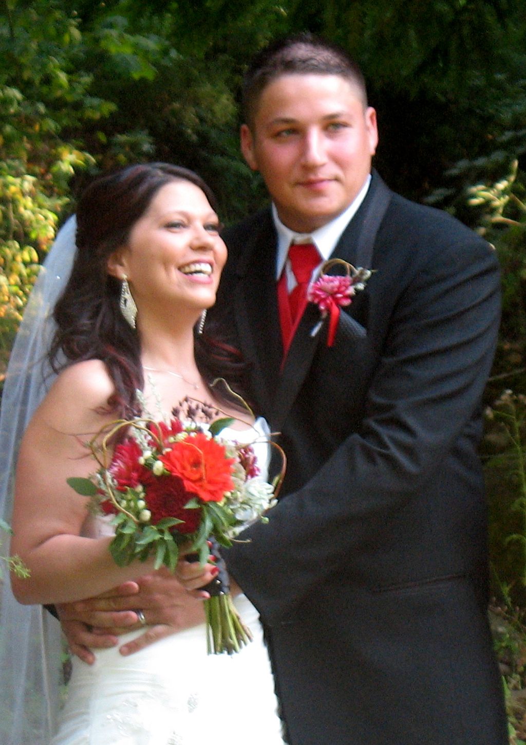 Alexis and Shannon's woodsy wedding flowers featur