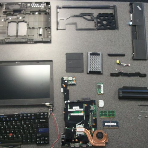 Laptop disassembled and thoroughly cleaned after a