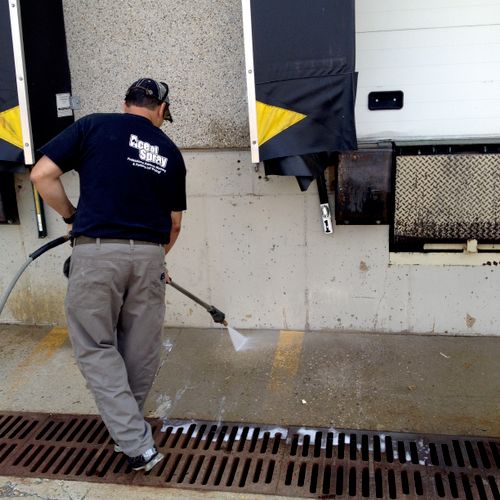 Power washing of loading dock(s) for cleaning and 