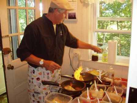 Chef Pierre making crepes suzette, flambeeing them
