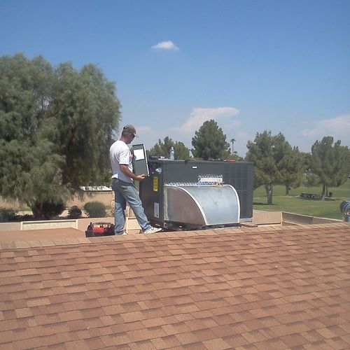 Me installing a rooftop unit w/10 yr warranty