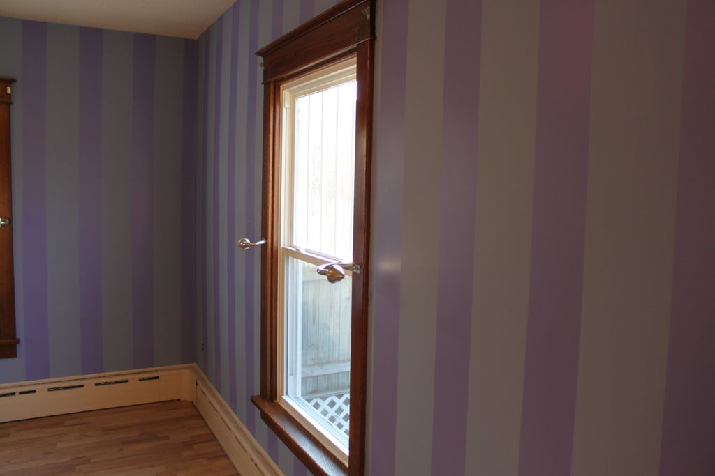 This room we removed the wallpaper and made a stri