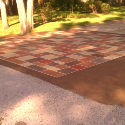 Stained the concrete driveway entrance. The custom