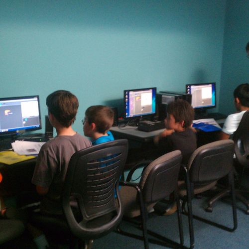 Students learning SCRATCH