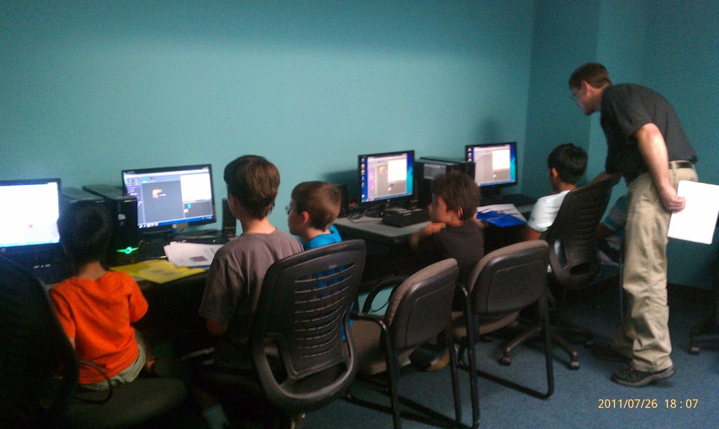 Students learning SCRATCH