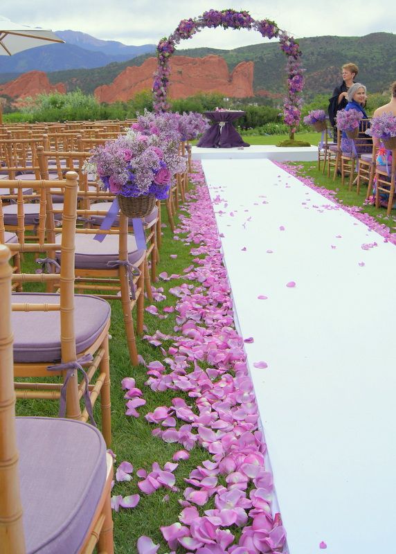 We provided the arch, aisle, florals and chairs fo