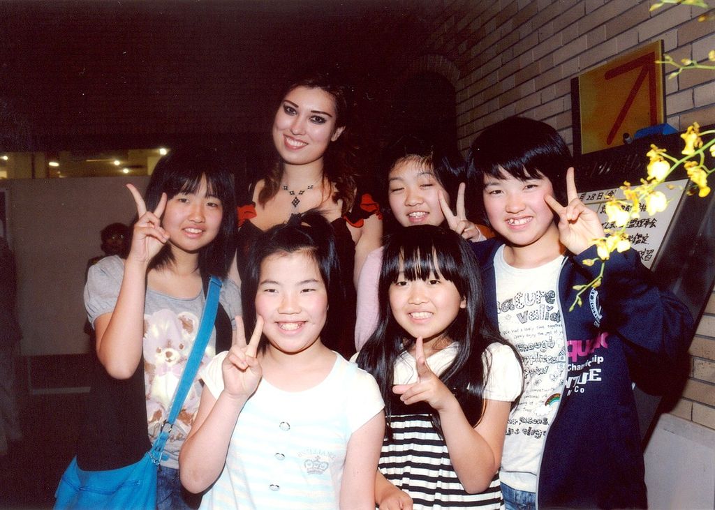 with fans after a concert in Japan