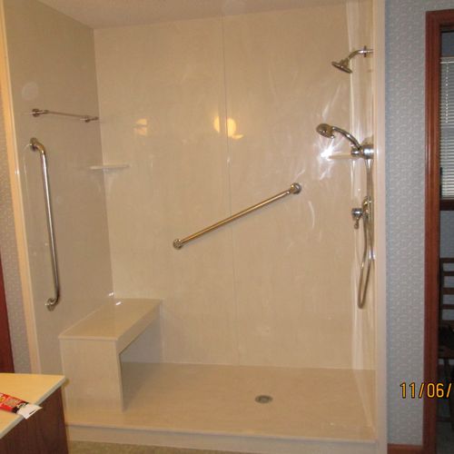 Custom cultured marble walk in shower with bench s