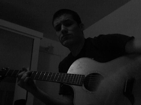 Another of me playing the acoustic guitar
