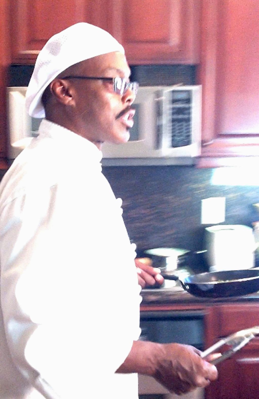 Chef Pharaoh D. on the set of his cooking show 'Di