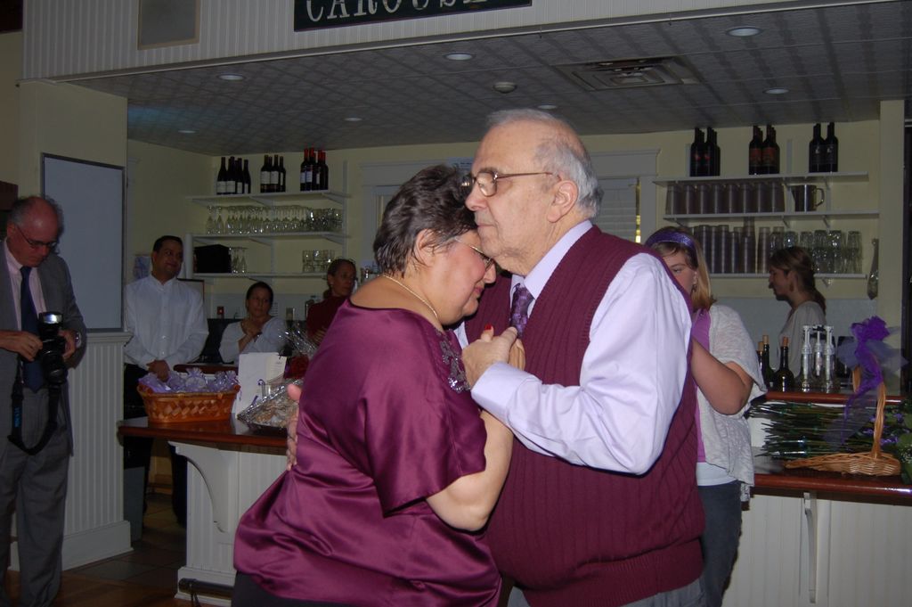Mr. and Mrs. Pescatello dancing to their song at t