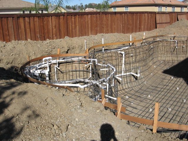 Inspection of pool steel while under construction.