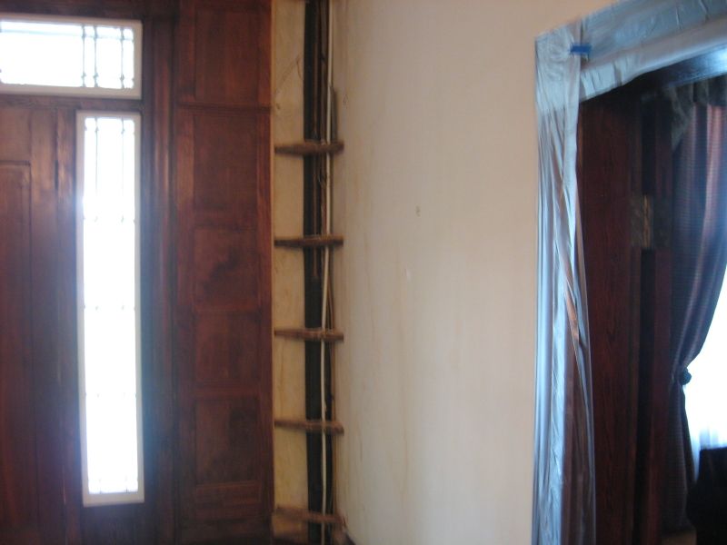 Entrance water damage 1832. Repairing