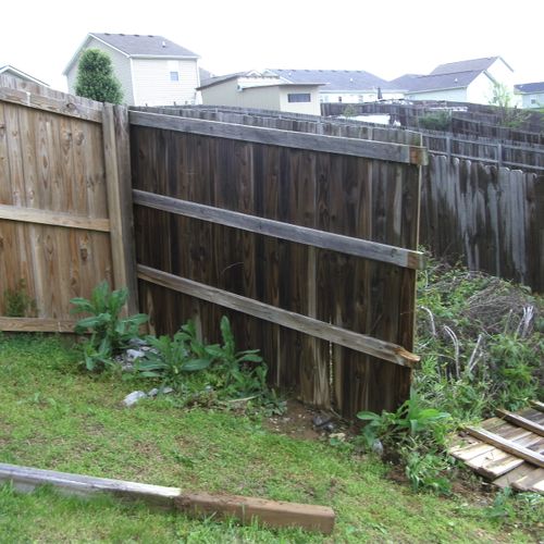 Removing old fence.