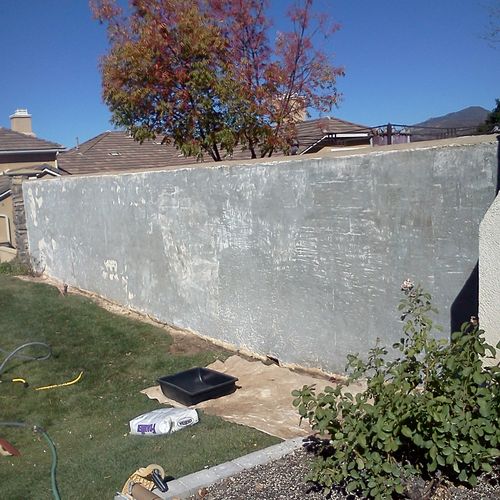 Restoring  peeling stucco walls...