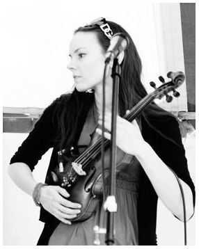 Rachel performing on stage at the Highlands Games 