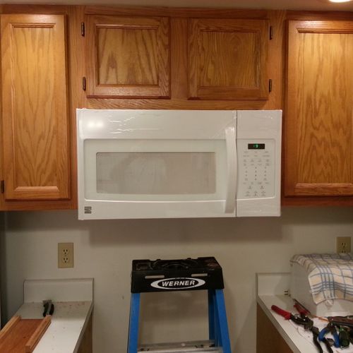 Installed over-the-range microwave with New 15 amp