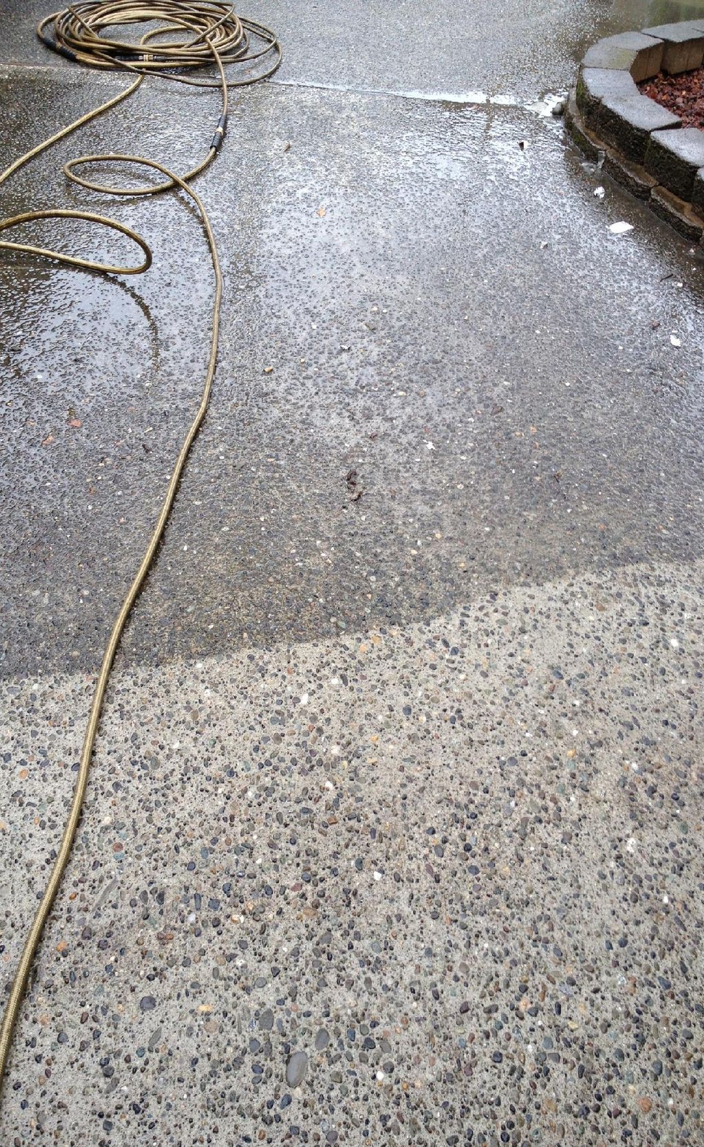 A driveway on a Silverdale home looks new after be