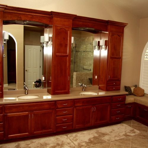 Full height dual vanity that maximizes storage spa