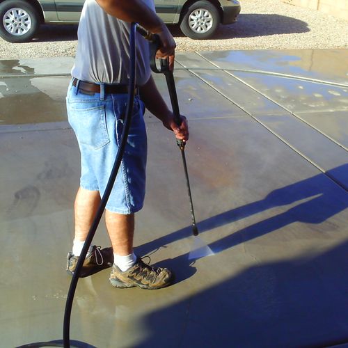 Power washing driveways makes them look new again.