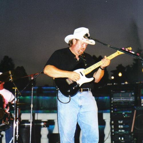 Ron performing at Cascade Falls in Jackson Michiga