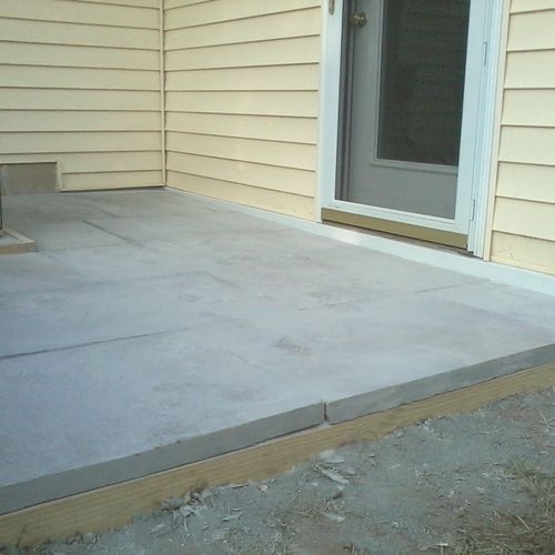 This flagstone patio solved many problems for this