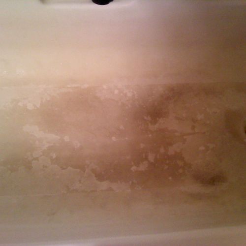 Before Pic of a tub we cleaned