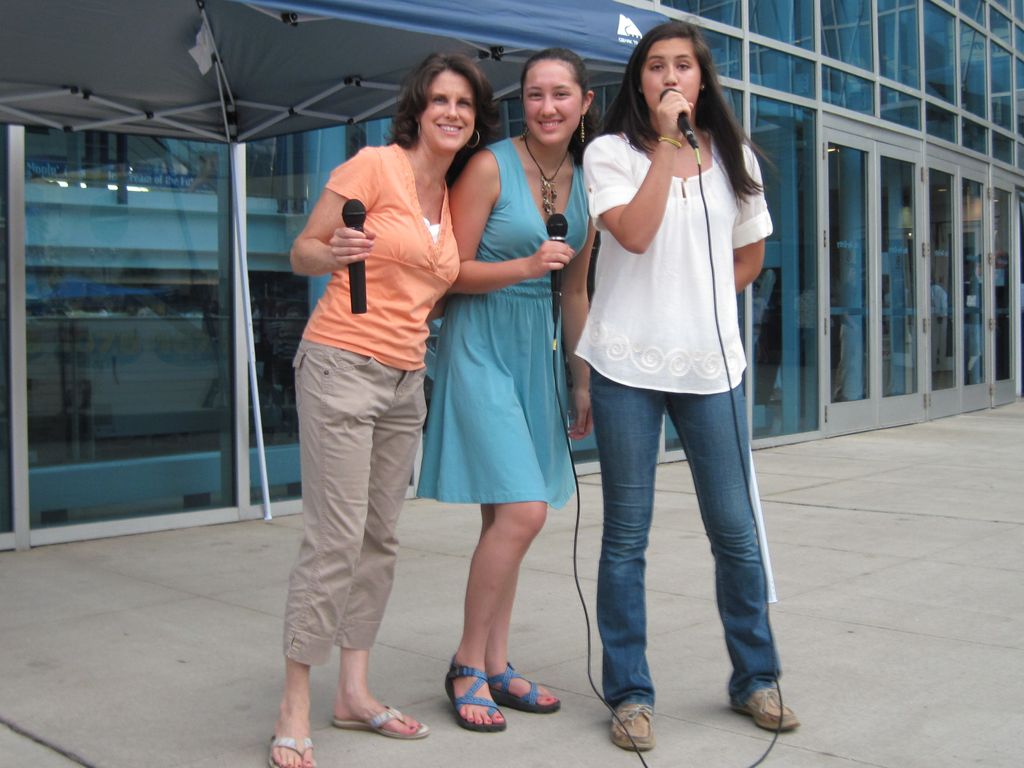 Mom and daughters doing Kaoroke with NMM on the Pl