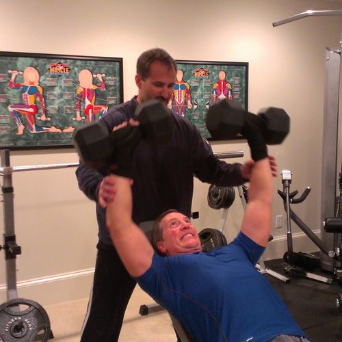 Jason lifts heavy with a client!