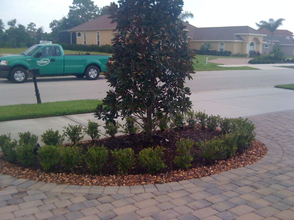 A nice way to accent a circle drive with the use o